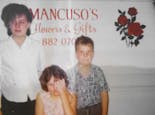 Three younger members of the Mancuso family lend a hand in the early 1980s
