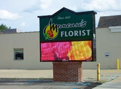 Our animated LCD sign shows off the latest arrangements in full color